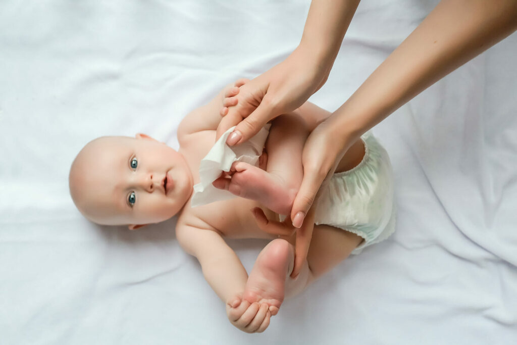 Newborn baby getting a diaper change