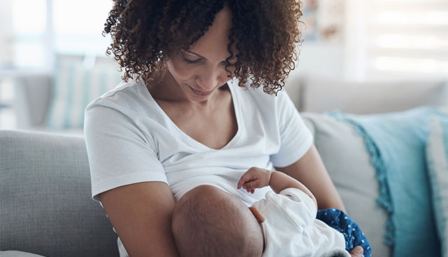 mother breastfeeding her child